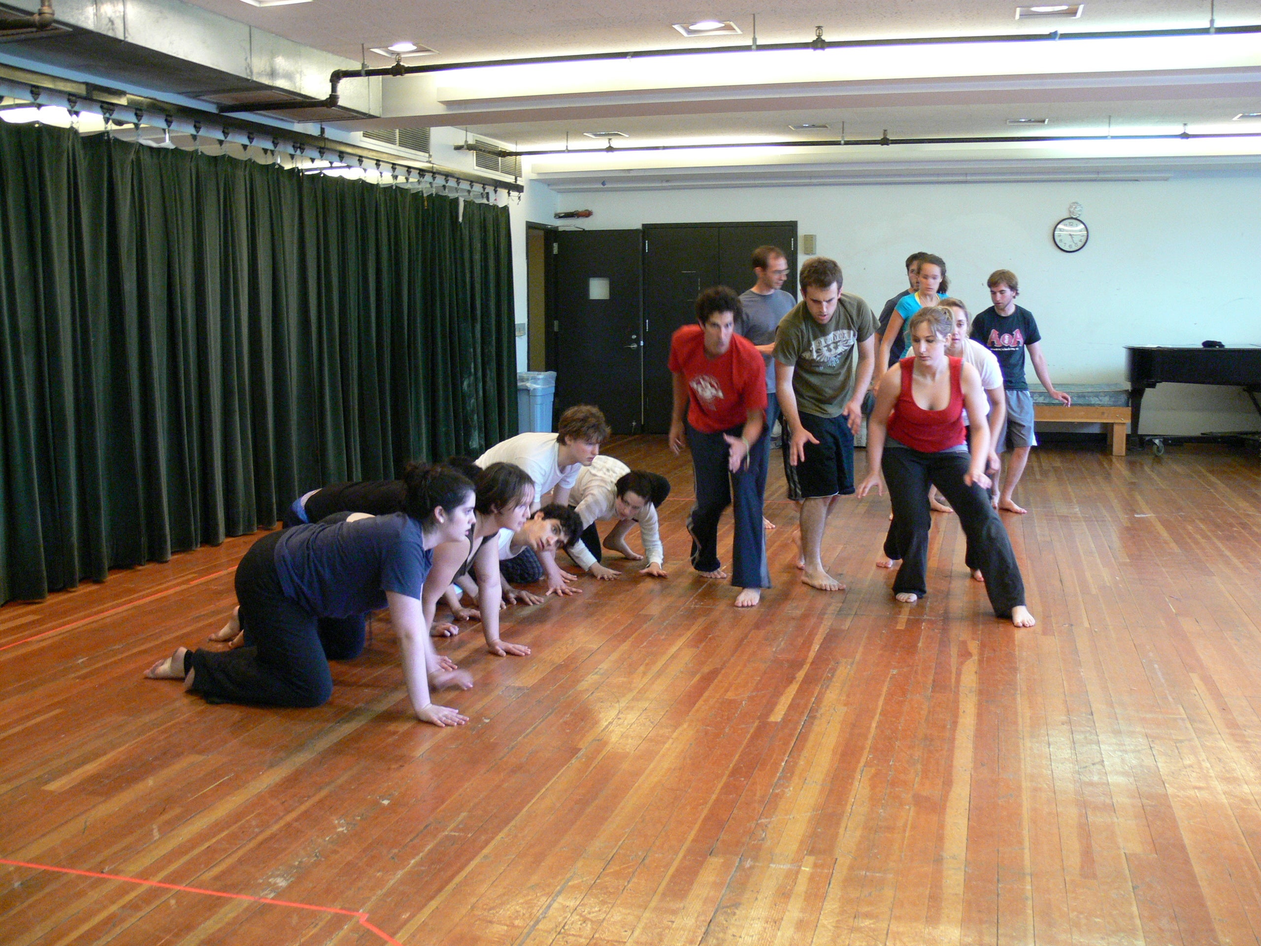 A community arts group work on their choreography.