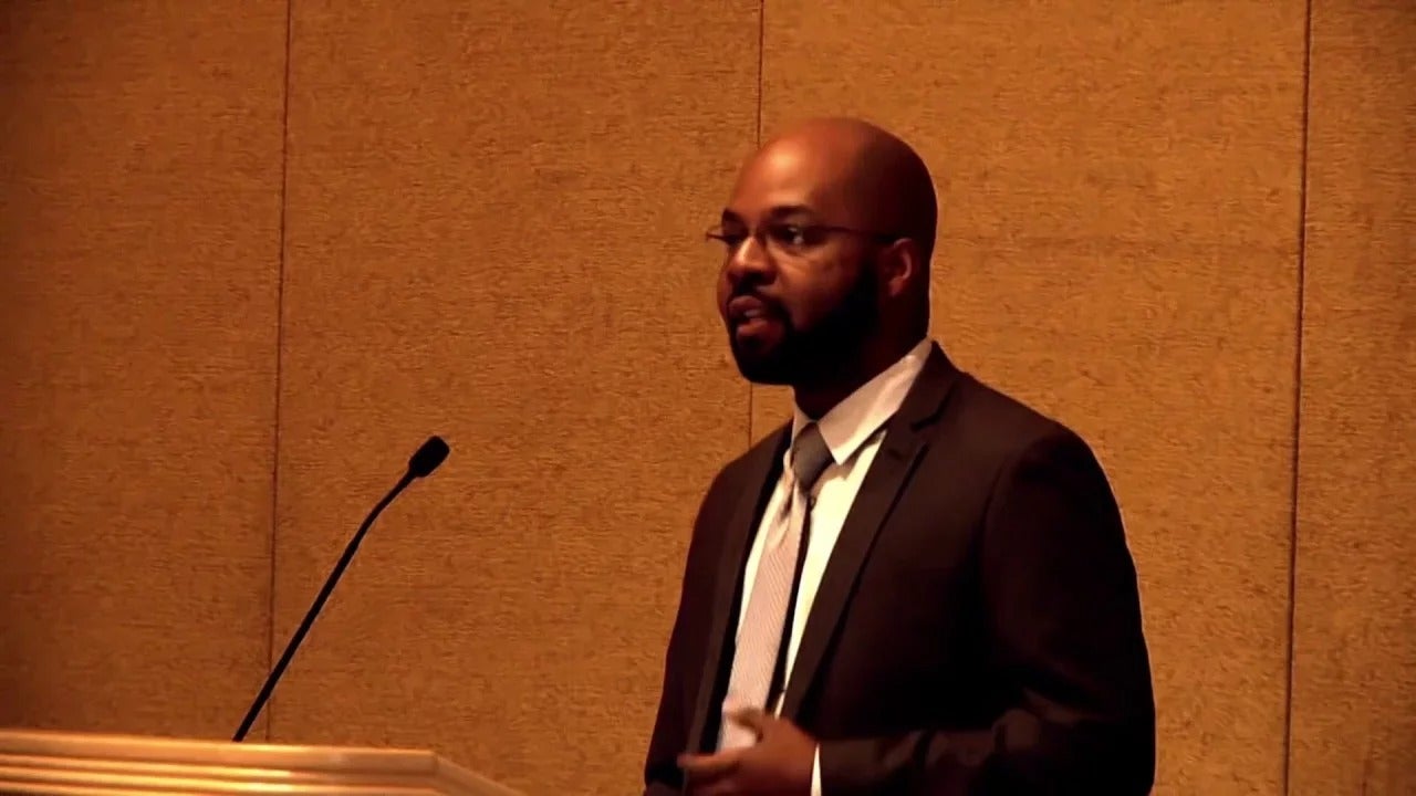 Nicholas Pelzer, a program officer in The Wallace Foundation, at a lectern.